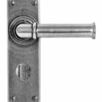Wexford Door Lever On Bathroom Backplate - Sprung